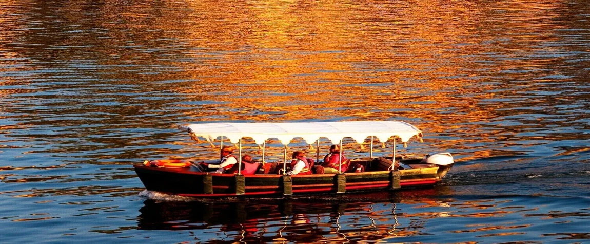 Boating at the sunset in Lake Pichola in Udaipur